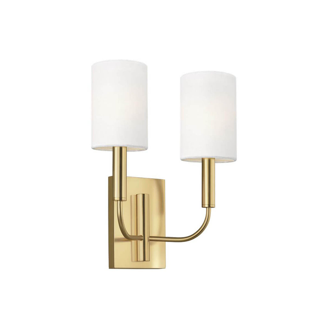 The Kiel Wall Sconce has a burnished brass rectangular backplate with two arms and cylindrical white linen shades.