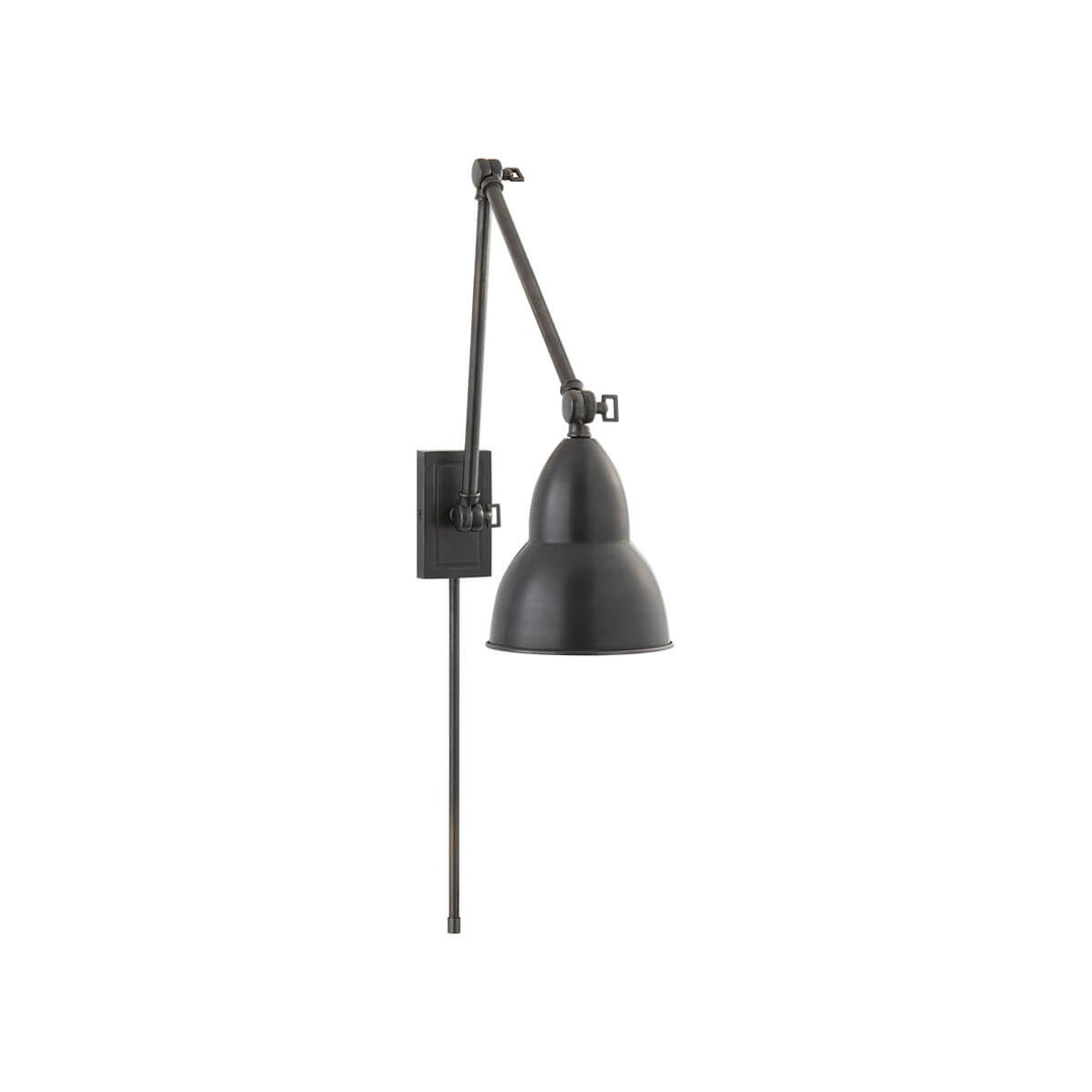 The French Library Wall Lamp hinges in three spots and has a classic shape in a bronze finish.