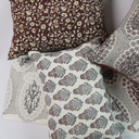 Izna Ruby on White Pillow