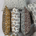 Izna Olive on White Pillow