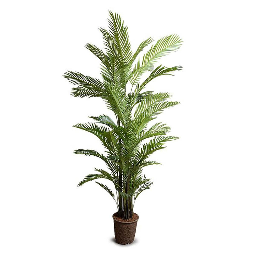 Medium size fake tropical plant with dark green leaves.