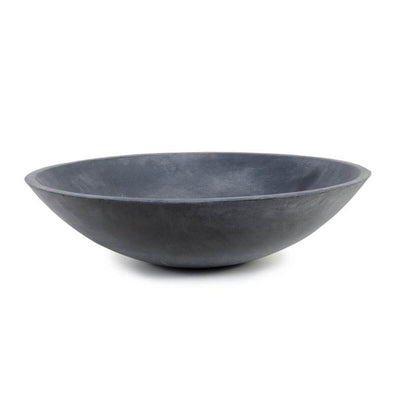 The Tonina Bowl is a black shallow fibreglass decorative bowl.