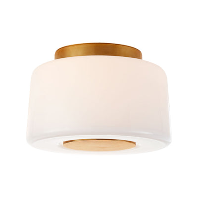 Circular flush mount ceiling light with glamorous and sophisticated soft brass elements and white glass.