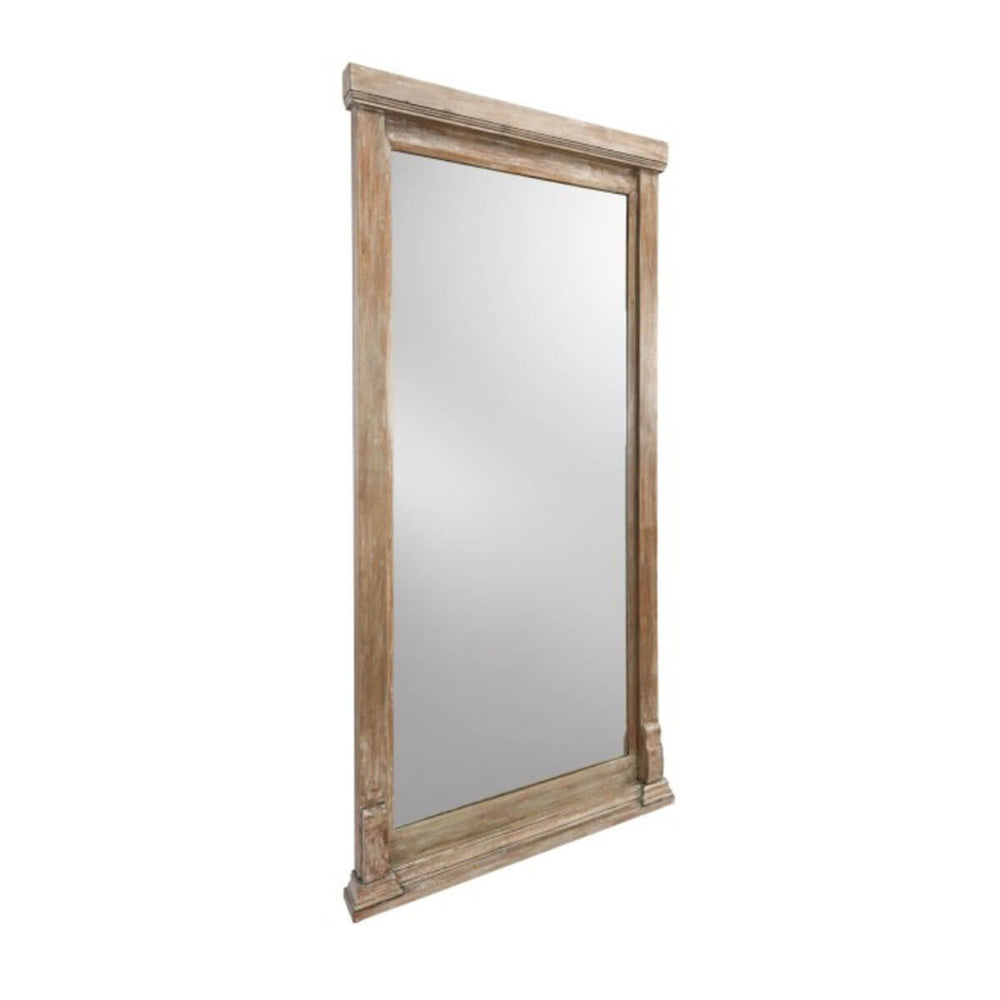 Large mirror with traditional wooden frame.
