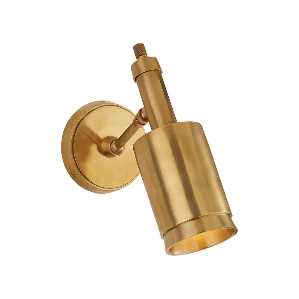 Anders Articulating Wall Sconce is an articulating wall light in a hand-rubbed antique brass finish with a modern shape.