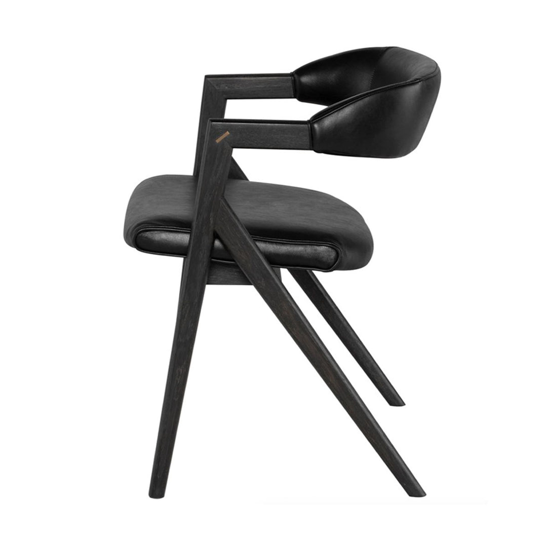 A modern dining chair with an interesting profile is created with this black leather and oak dining chair. The long angled legs add interest and the cushioned leather seats add comfort.
