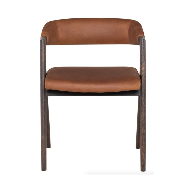 A seared oak dining chair that has a comfortable cushioned back and seat which is covered in a rich cognac leather.