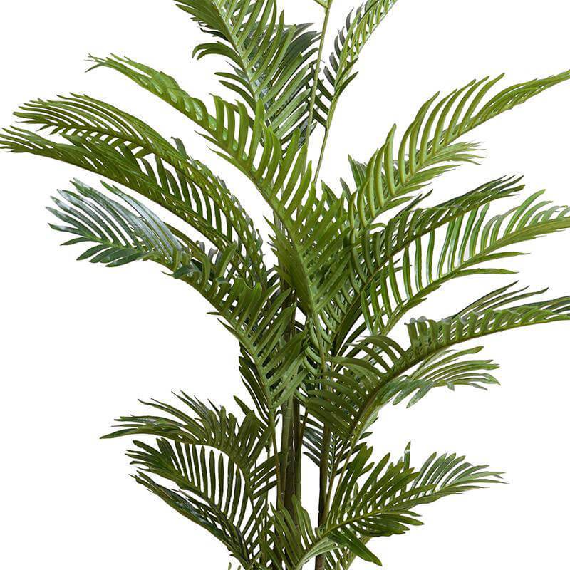 Medium size fake tropical plant with dark green leaves.