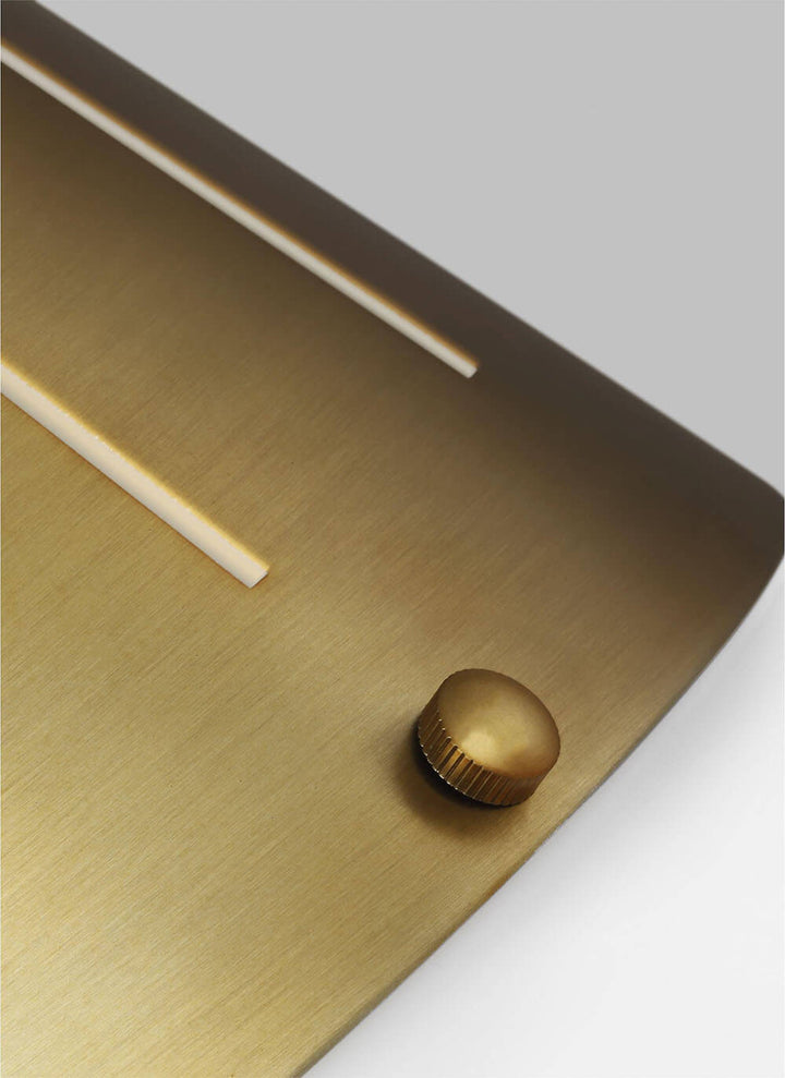 Burnished brass knob and line detailing on the Volos Pendant.