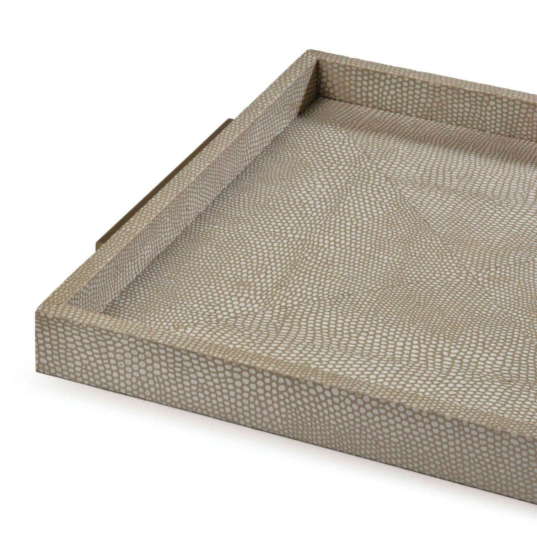 A close up of the textural, decorative tray that is finished in an ivory grey shagreen leather.