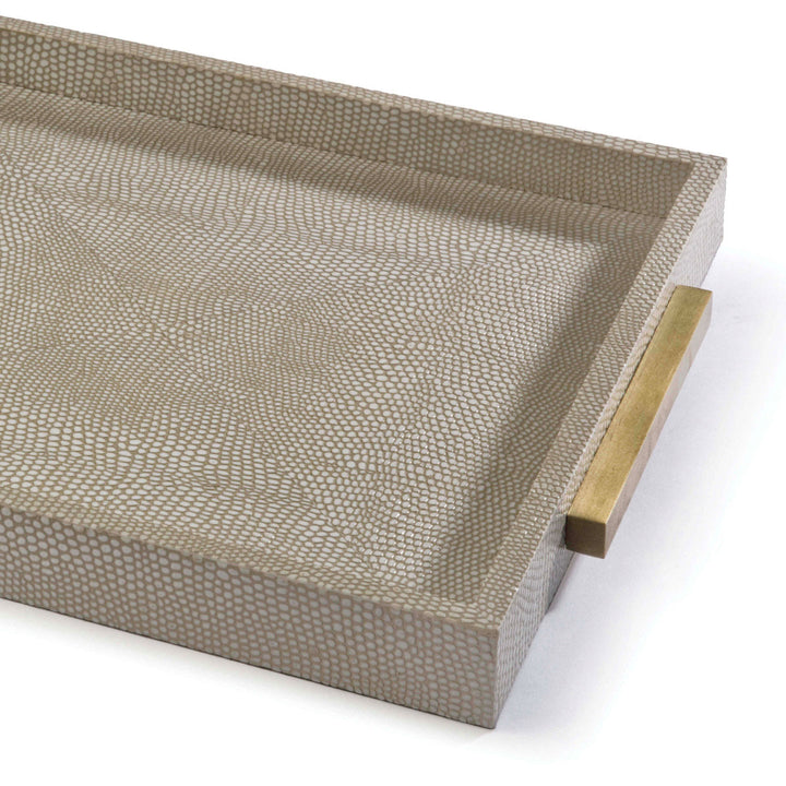A close up of this decorative tray covered in an ivory grey shagreen leather with brass handles.