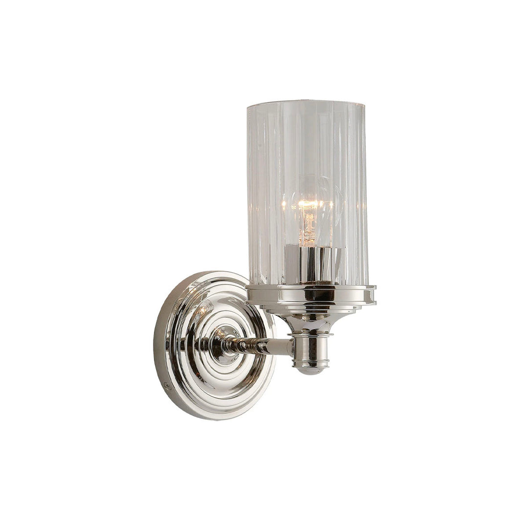 An antique style sconce combining polished nickel with crystal glass.