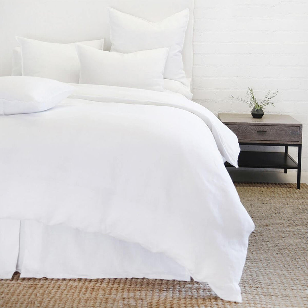 The Berlin Bedding Collection is a white, 100% linen duvet cover with tie closures and subtle frayed edge.