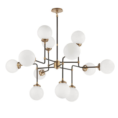 Bistro Chandelier has twelve white glass globes and hand-rubbed antique brass curved rods to create a modern, whimsical look.