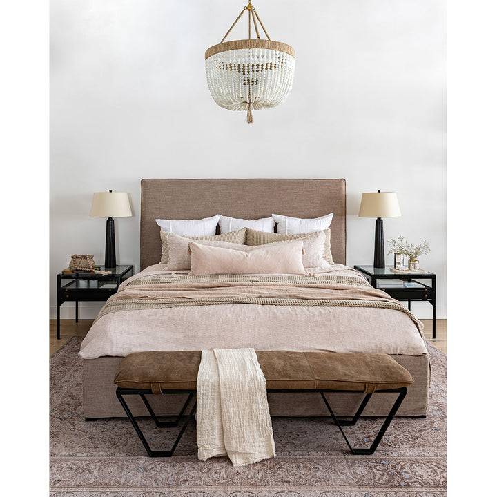 Rustic, modern bedroom with feminine blush tones mixed with neutrals.