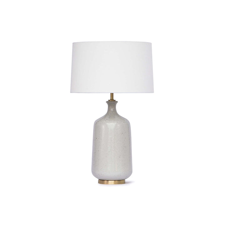 Ceramic glazed smooth silhouette with a natural linen shade.