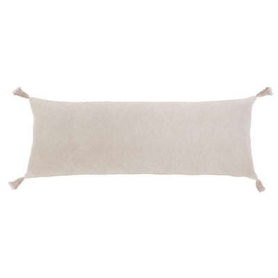 The Banjul Pillow - Blush is a blush velvet rectangular pillow with tassels in the corner.