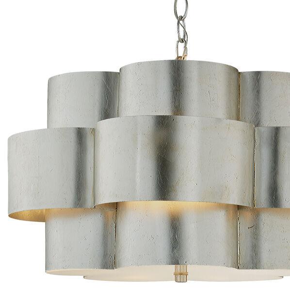 Burnished silver leaf statement chandelier with a tiered, scalloped shape.