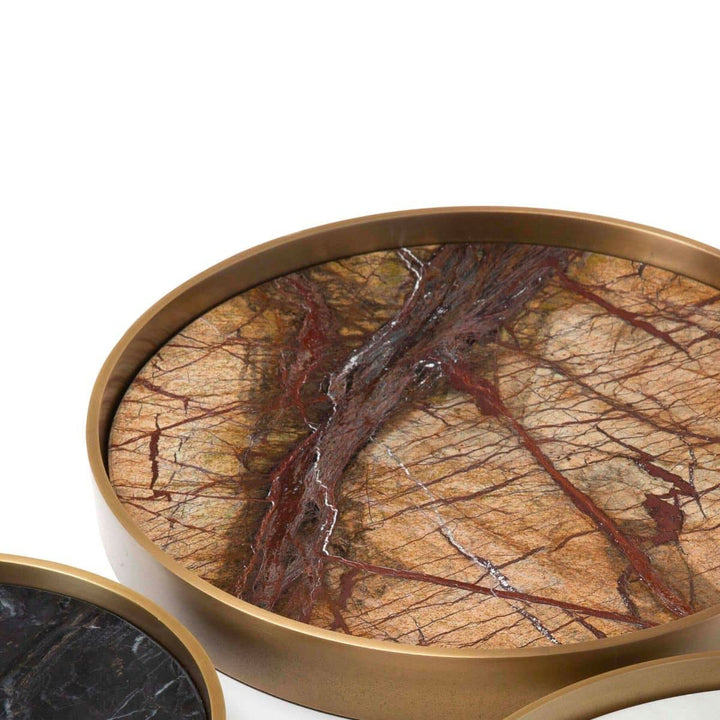 Earthy brown marble tray surrounded by a natural brass frame.