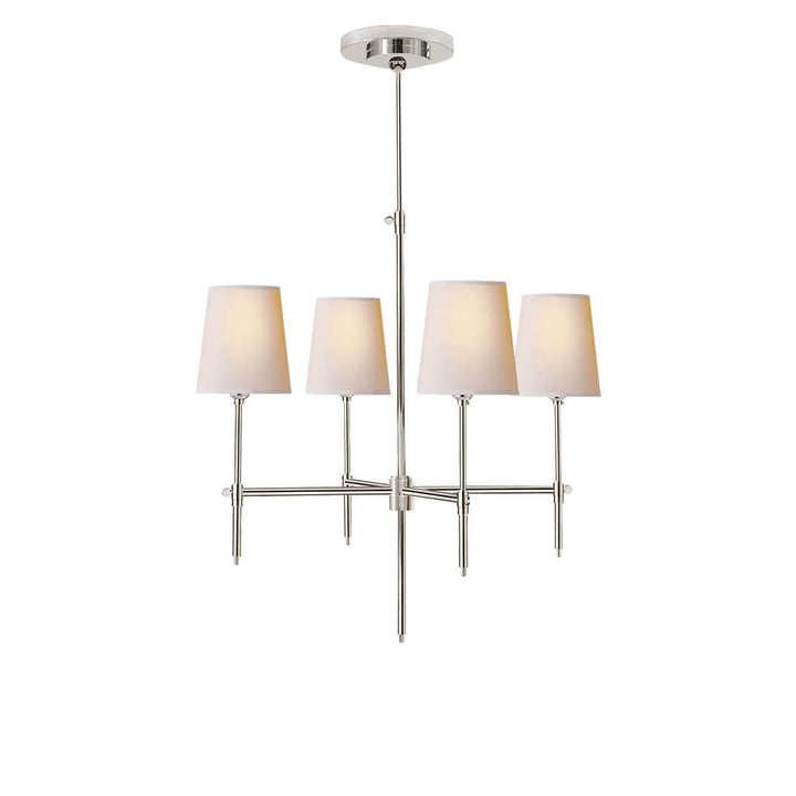 The Bryant Chandelier has a traditional candelabra frame with polished nickel arms and four lights with natural paper shades.