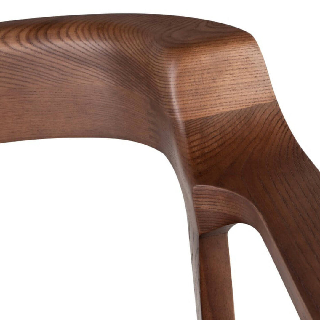 Solid walnut wood grain and rounded back details on the Odense Dining Chair.