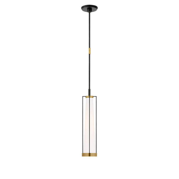 The Calix Tall Pendant has a tall, slim bronze cage with brass details around a white glass, cylinder shade.