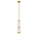 The Calix Tall Pendant has a tall, slim hand rubbed antique brass cage around a clear glass, cylinder shade.