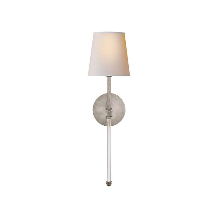 The Camille Wall Sconce has a simple natural paper shade and clear glass and antique nickel stem and backplate.
