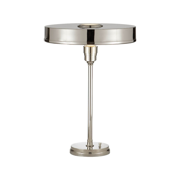 The Carlo Table Lamp is a classic metal desk lamp with a polished nickel finish and a flat, round shade.