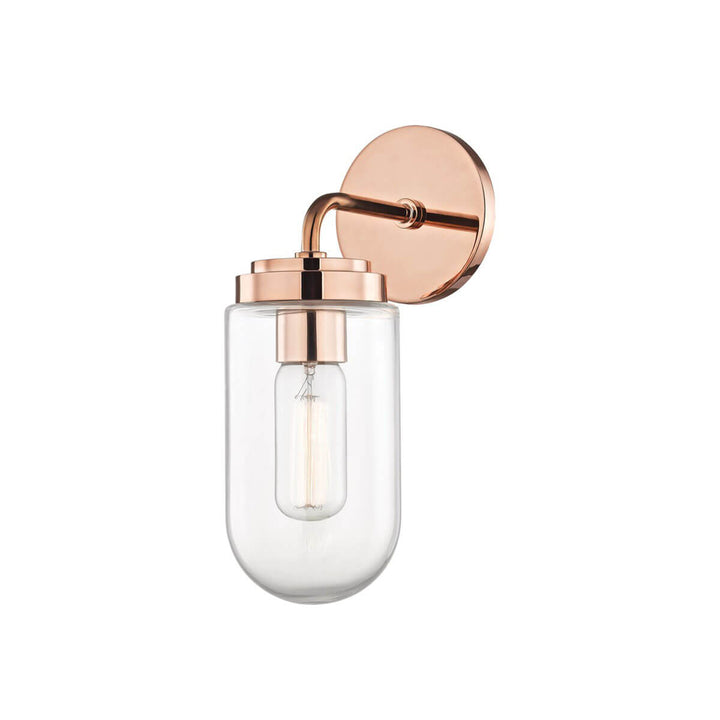 Modern lantern shaped wall sconce with a polished copper finish.