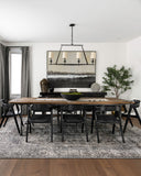 The Etoile Linear Chandelier in a dining room lifestyle shot.