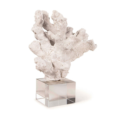 Realistic sculpture replica of coral on a square crystal base.