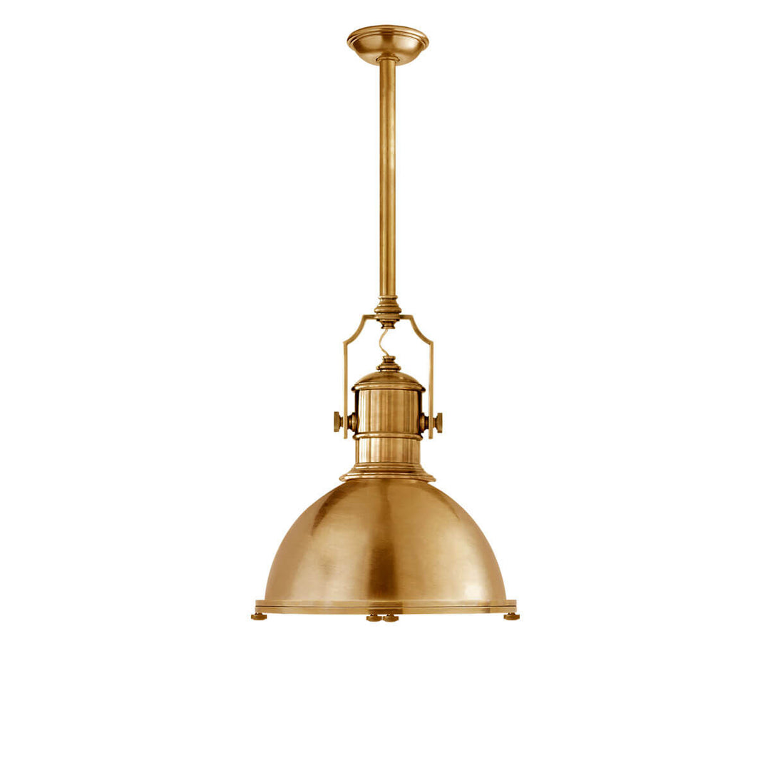 The Country Industrial Pendant is an industrial looking light with a thick antique burnished brass rod, antique burnished brass shade and bolt details.