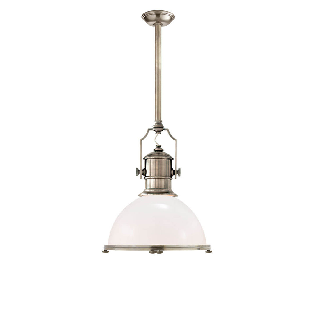 The Country Industrial Pendant is an industrial looking light with a thick antique nickel rod, white glass shade and bolt details.