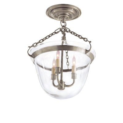 The Country Semi-Flush Bell Jar Lantern is a semi flush light with a bell shaped glass shade, candle-lick lights and antique nickel chain and accents.