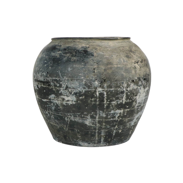 The Madera Pot is a vintage clay jar from China with an aged patina.