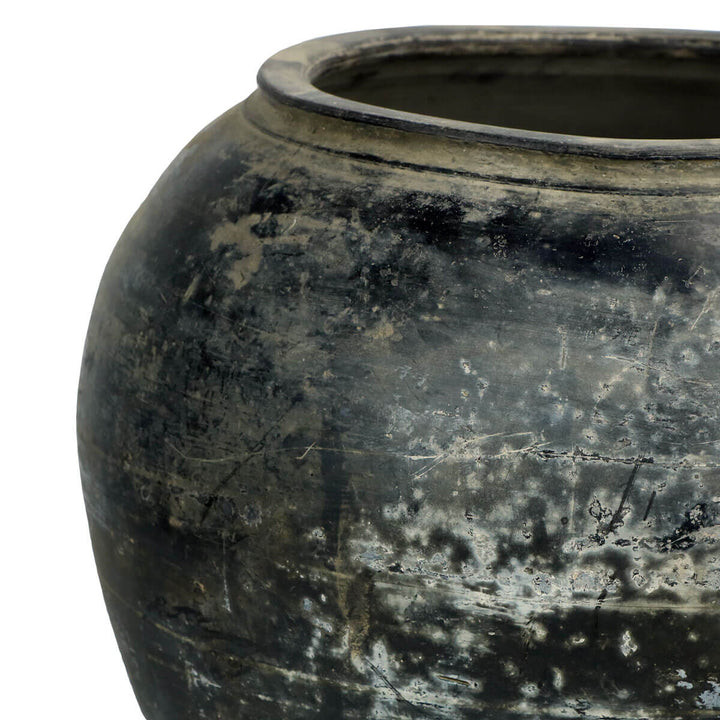 One of a kind black clay pot with a vintage, distressed look.