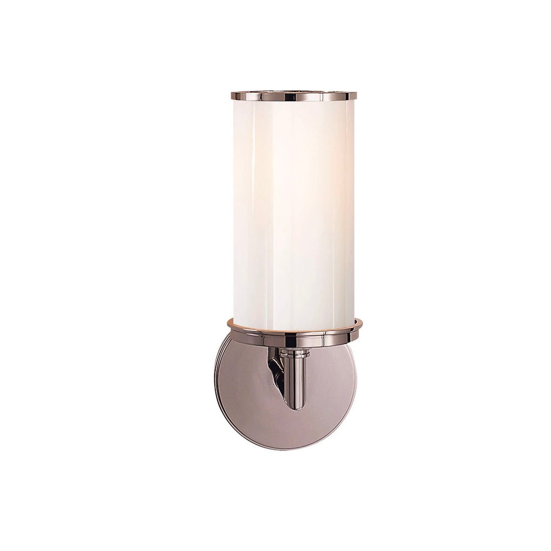 Cylinder Sconce in polished nickel is a simple sconce with white glass. Meant to compliment a bathroom vanity.