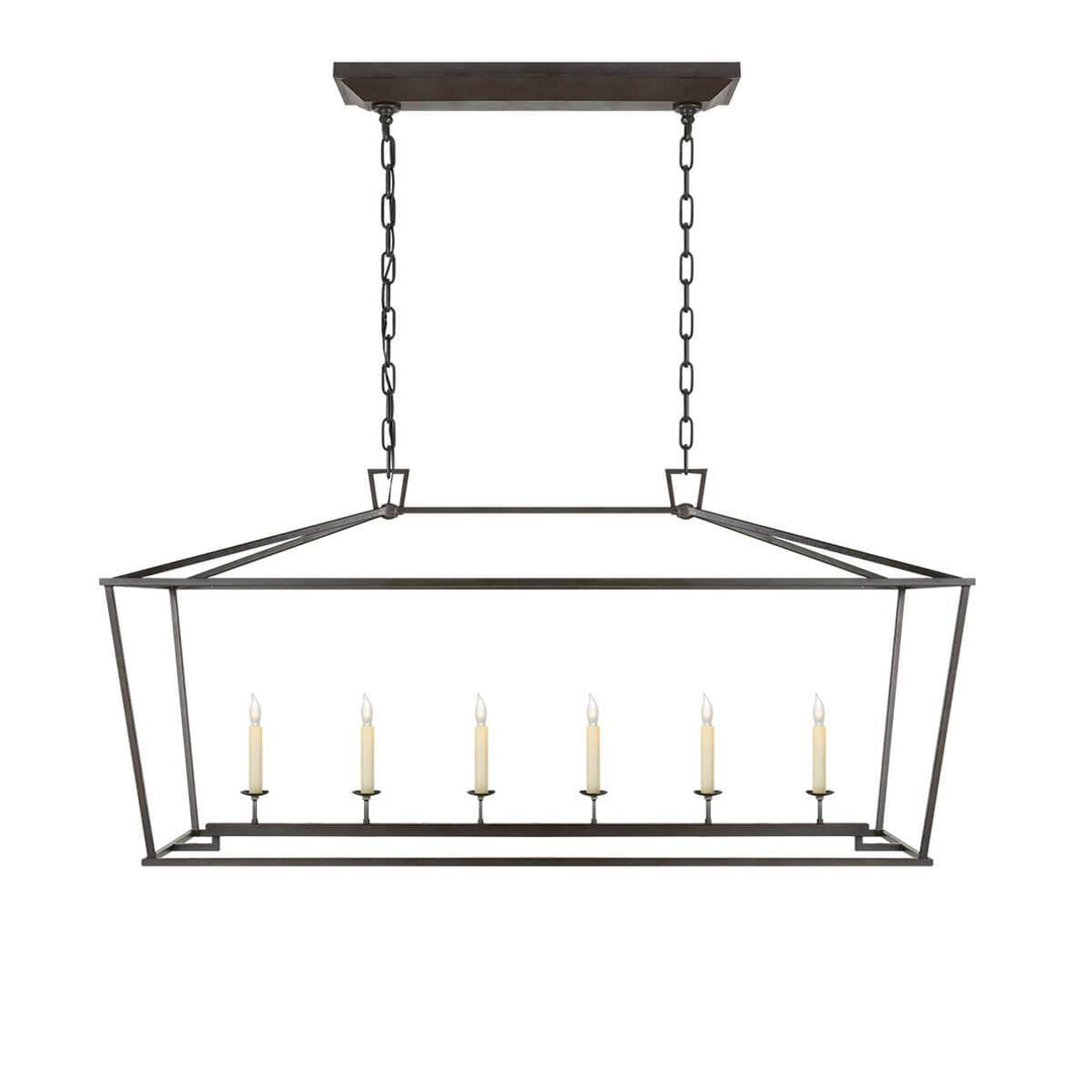 The Darlana Large Linear Lantern Lantern is an aged iron metal lantern frame with five candle-like lights.