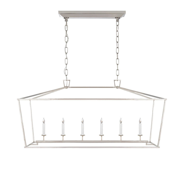 The Darlana Large Linear Lantern Lantern is a polished nickel, metal lantern frame with five candle-like lights.