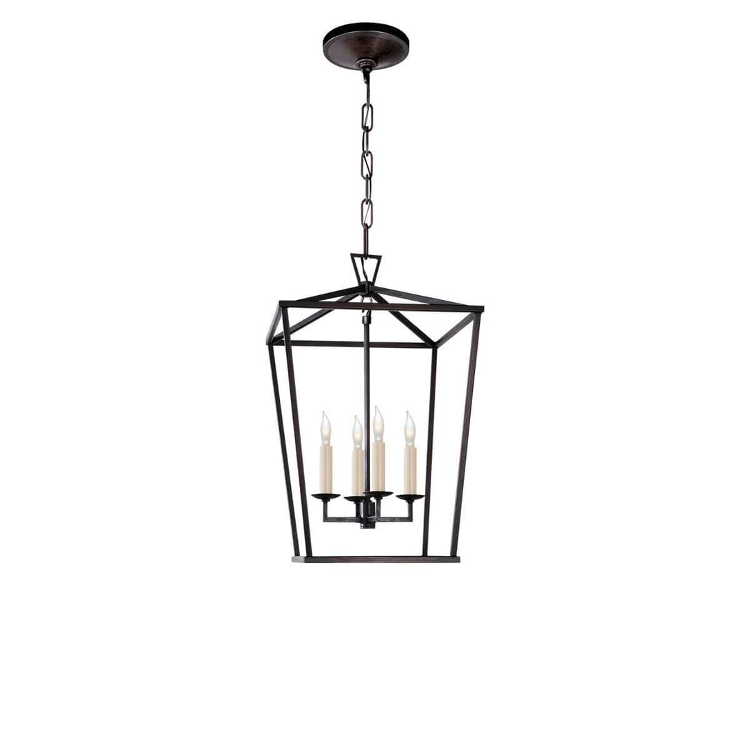 The Darlana Lantern is a small aged iron metal, square lantern frame with five candle-like lights.