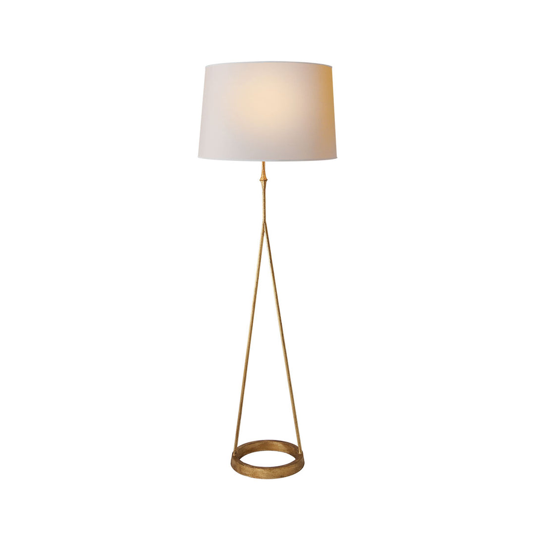 The Dauphine Floor Lamp has a circular ring bas and double rod column base in a gilded iron finish with a natural paper shade.