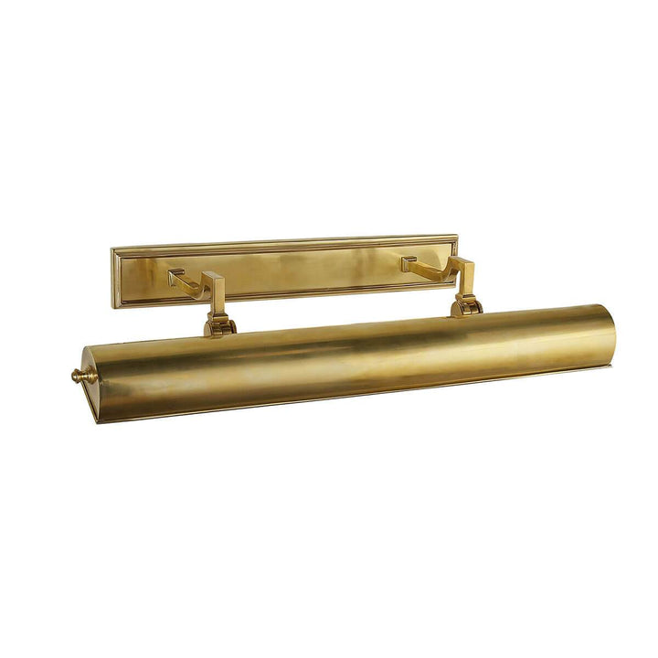 The Dean Picture Light is an 24 inch classic picture light in a natural brass finish with a rectangular backplate.