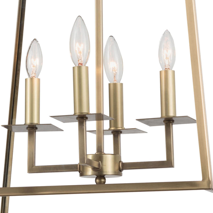 Traditional candle-like bulbs in the Delft Lantern. Modern lantern pendant with a brass finish.