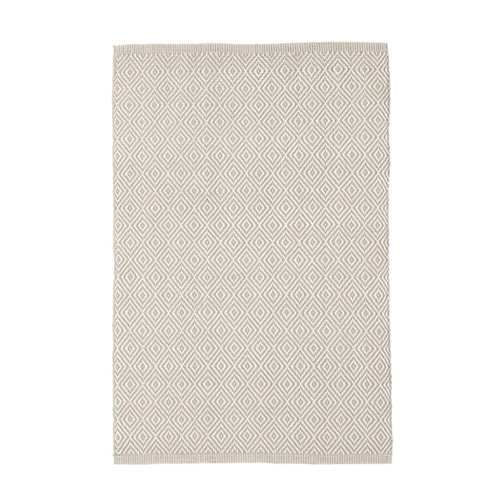 Beige diamond textured indoor outdoor rug. Durable, washable, and bleachable.