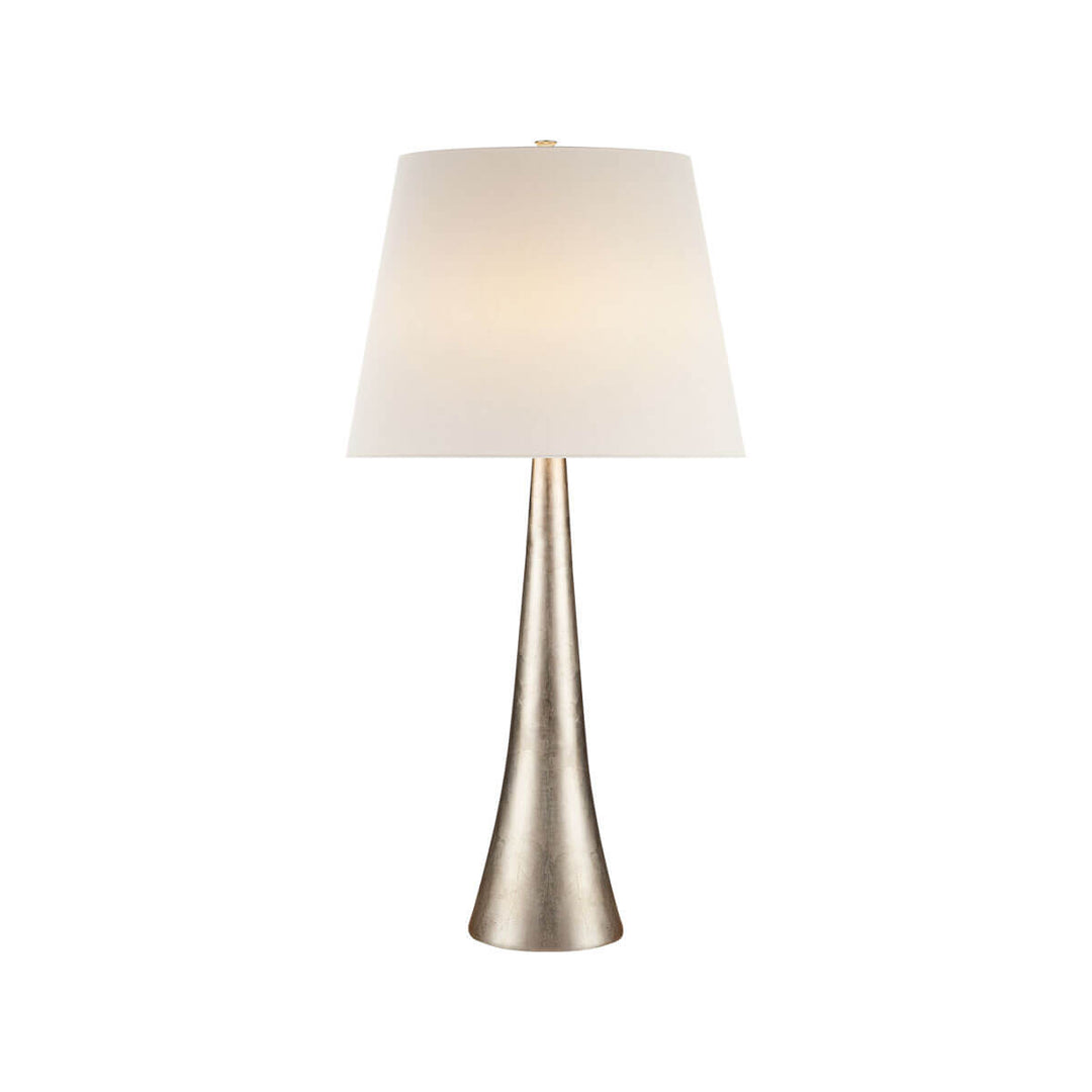 The Dover Table Lamp has a tall, cone-shaped base with a burnished silver leaf finish and a linen shade.