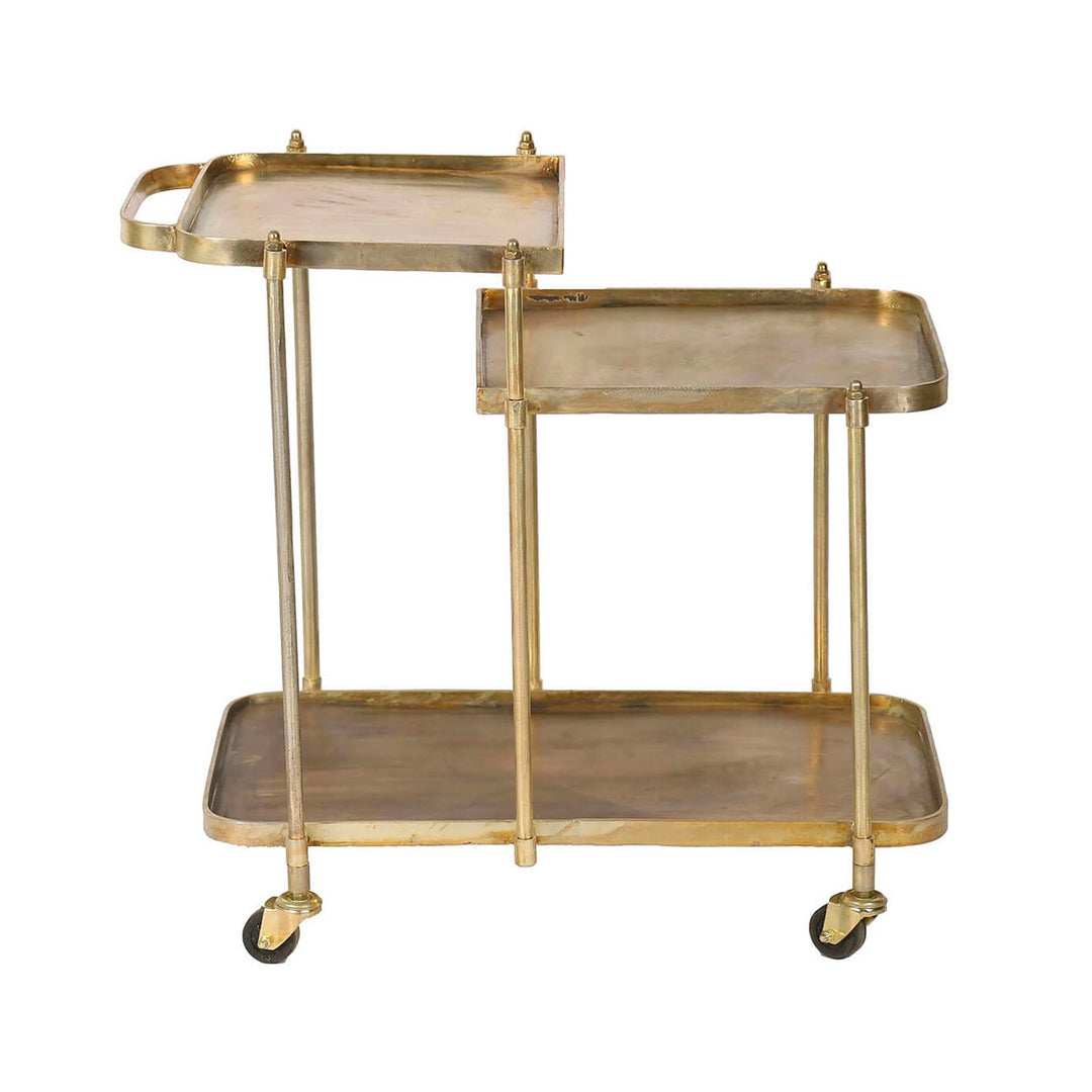Two-tiered bar cart made from forged iron in an antique brass finish.