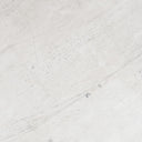 Closeup of the concrete laminate tabletop on the Honey Brook Dining Table.
