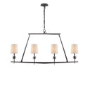 The Etoile Linear Chandelier has a black linear frame with four small lights with natural paper shades and small star detail.