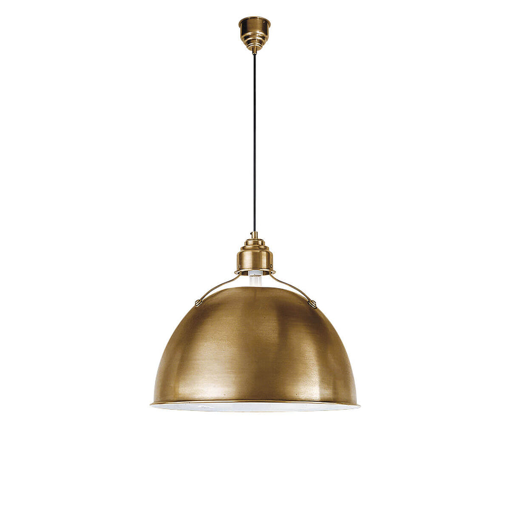 The Eugene Pendant has a simple, half circle metal shade in a hand-rubbed antique brass finish with black rod hanger perfect for commercial lighting.